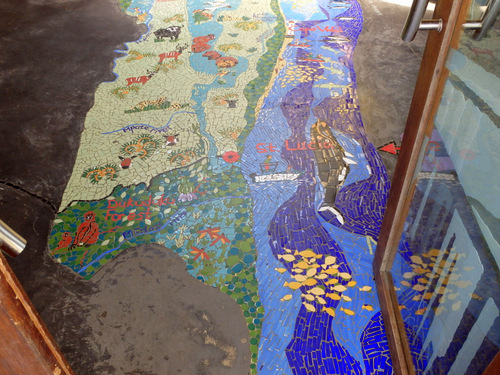 Segment pictures of a mosaic floor map of the St Lucia area.